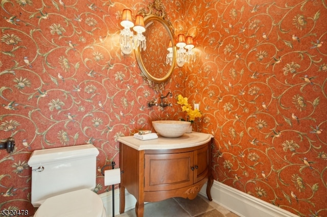 bathroom with vanity and toilet