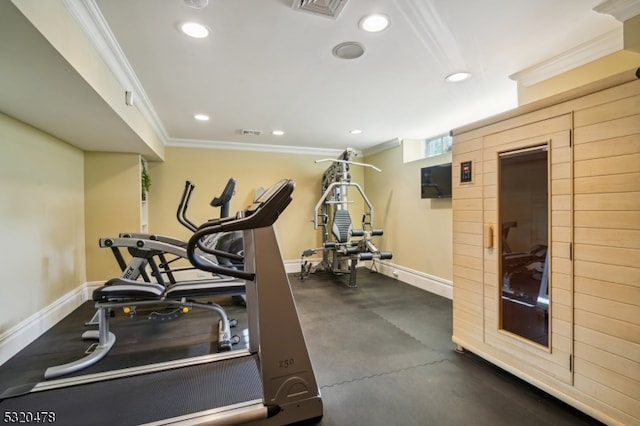 exercise room with ornamental molding