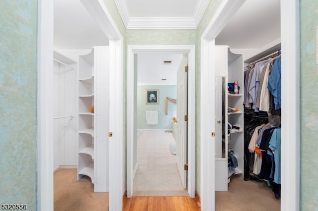 spacious closet featuring light hardwood / wood-style floors