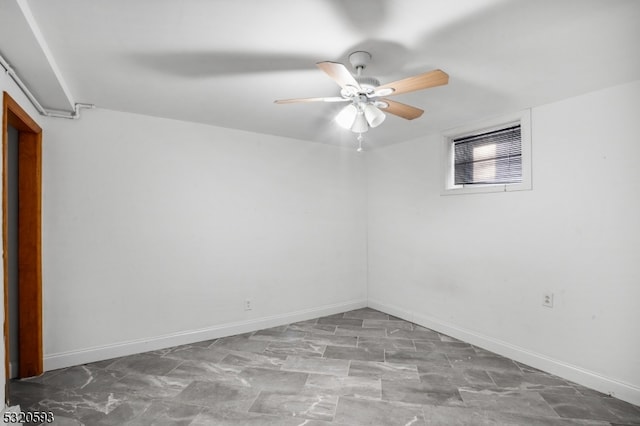 unfurnished room with ceiling fan