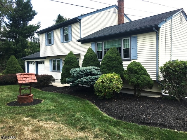 exterior space featuring a front lawn