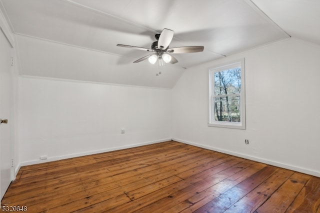 additional living space featuring lofted ceiling, wood-type flooring, and ceiling fan