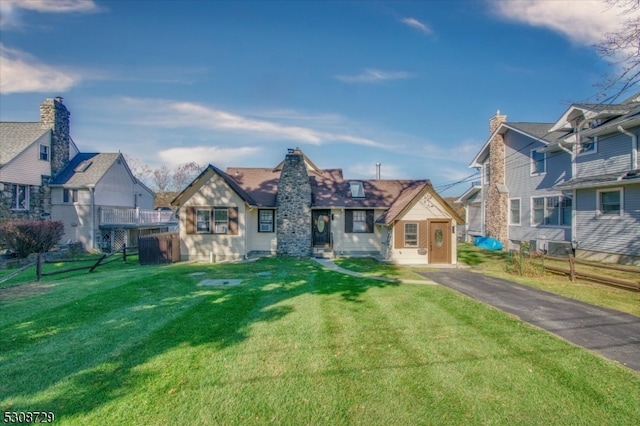 view of front of house with a front lawn