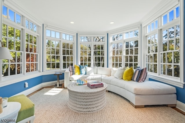 sunroom / solarium featuring plenty of natural light