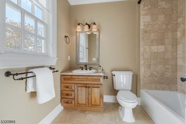 full bathroom with toilet, tile patterned flooring, tiled shower / bath, ornamental molding, and vanity