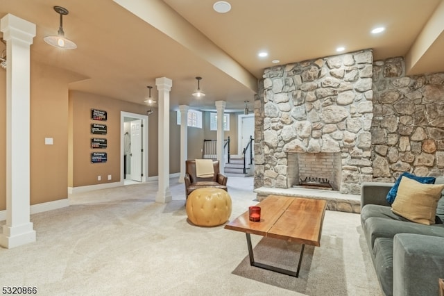 living room with light colored carpet and a fireplace