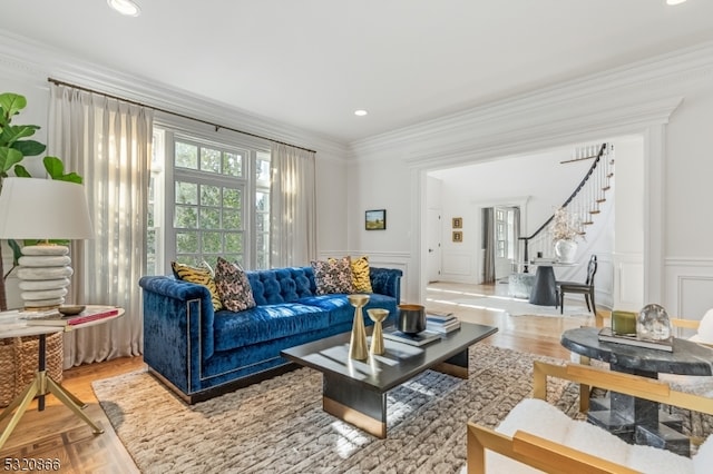 living room featuring crown molding