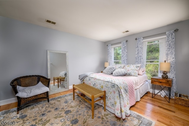 bedroom featuring hardwood / wood-style floors