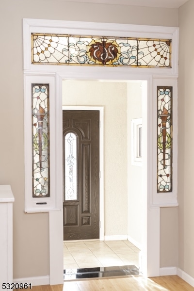 entrance foyer featuring hardwood / wood-style flooring