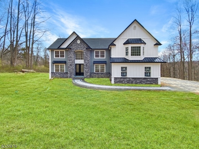 view of front of home with a front lawn