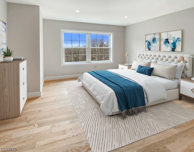 bedroom with light hardwood / wood-style floors