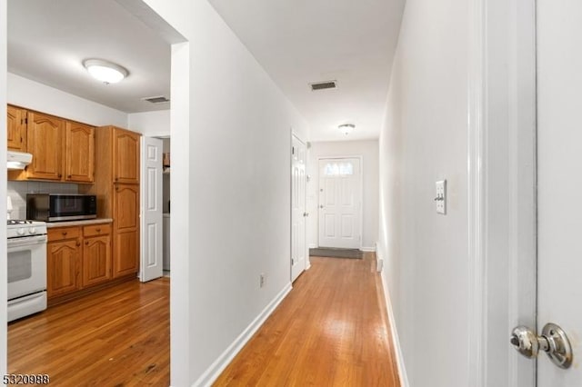 hall featuring light wood-type flooring