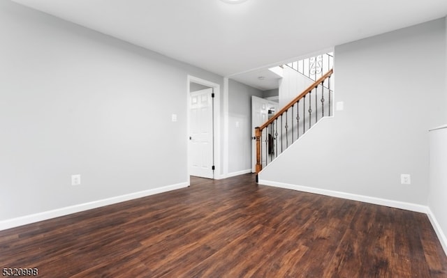 interior space with dark hardwood / wood-style floors