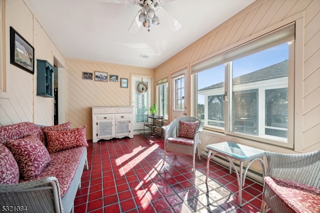 sunroom / solarium with ceiling fan