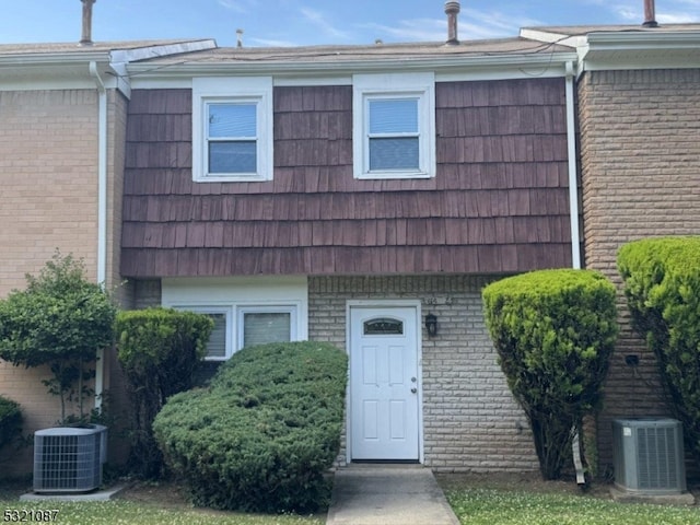 view of front of property featuring cooling unit