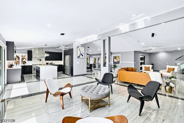 living room with a notable chandelier