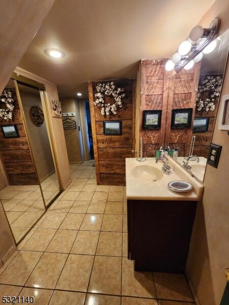 bathroom featuring vanity and tile patterned flooring