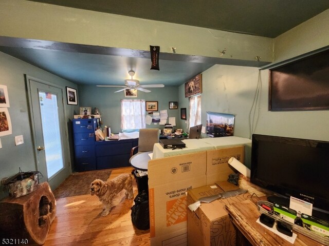 kitchen featuring tile countertops, wood-type flooring, and ceiling fan