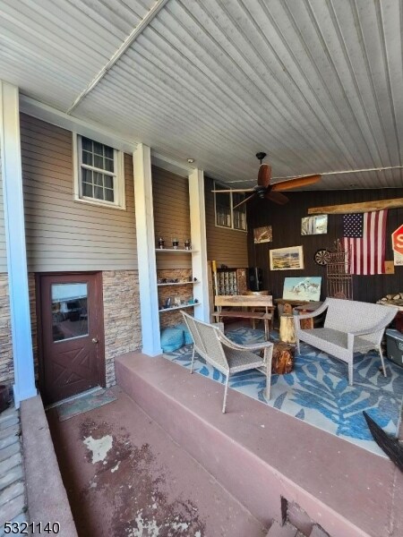 view of patio with ceiling fan