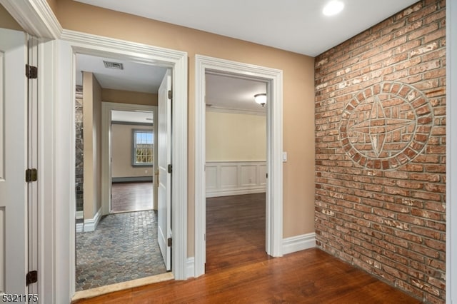 hallway with dark wood-type flooring