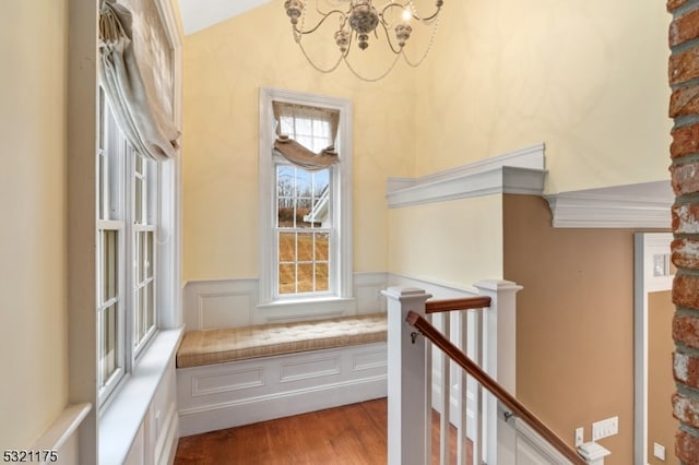 interior space with an inviting chandelier and light hardwood / wood-style flooring