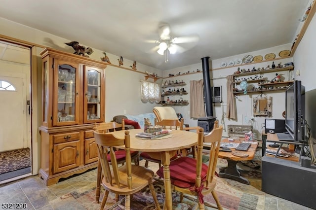 dining space featuring ceiling fan