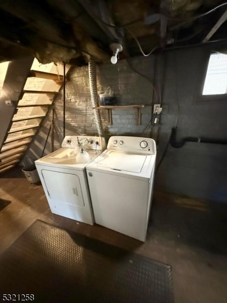 laundry room with washer and dryer