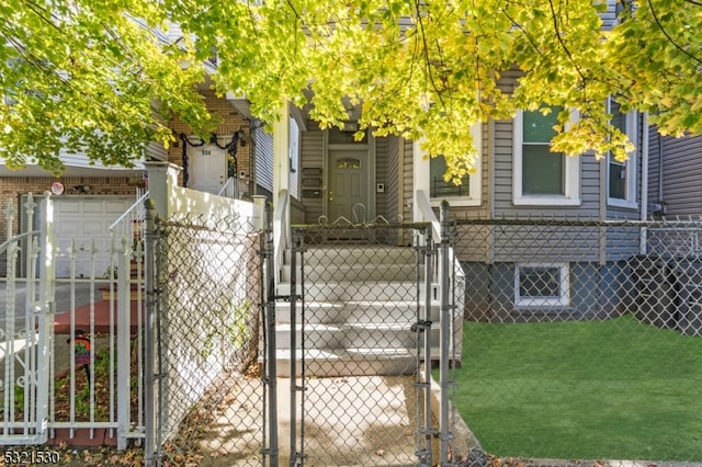 view of front facade featuring a front yard and a garage