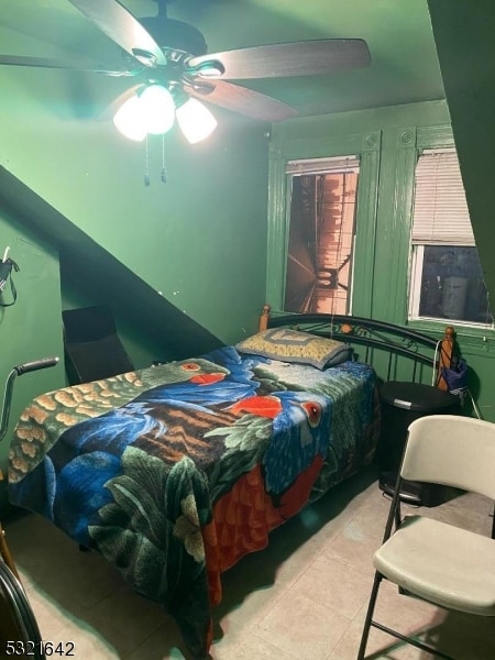 bedroom featuring ceiling fan