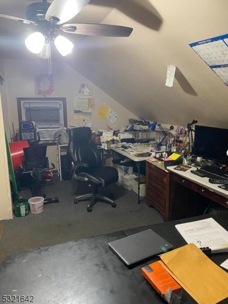 home office with ceiling fan and lofted ceiling