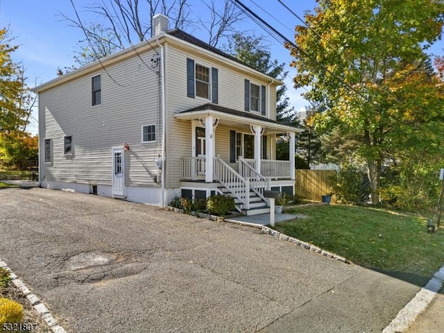 8 Mine Ave, Bernardsville Boro, NJ 07924 - american foursquare style home with a chimney, a porch, and fence