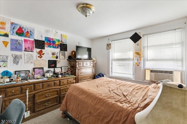 bedroom featuring carpet and cooling unit