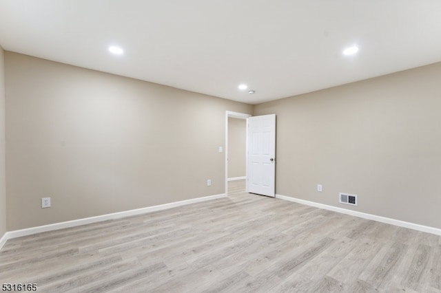 unfurnished room featuring light wood-type flooring