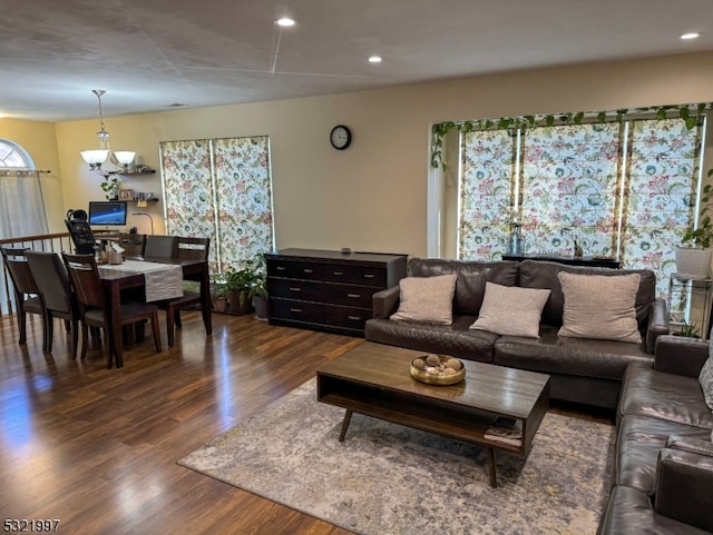 living room featuring dark wood-type flooring