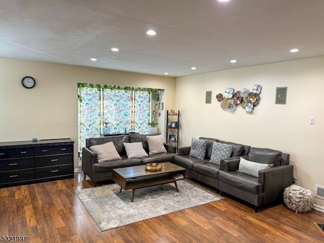 living room featuring dark hardwood / wood-style floors