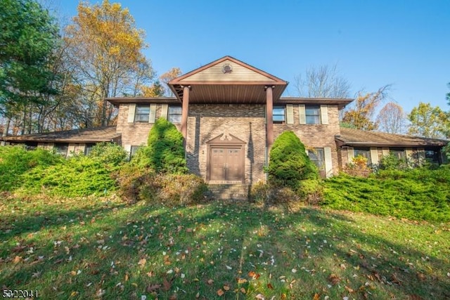 74 S Powder Mill Rd, Parsippany-Troy Hills Twp, NJ 07950 - view of front of house featuring brick siding