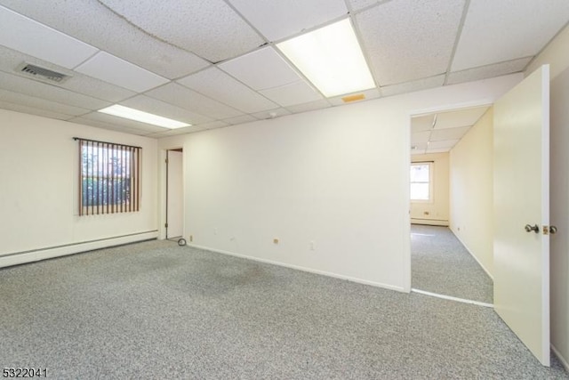 74 S Powder Mill Rd, Parsippany-Troy Hills Twp, NJ 07950 - carpeted spare room featuring a paneled ceiling and a baseboard radiator