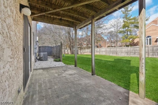 view of patio with central air condition unit and fence