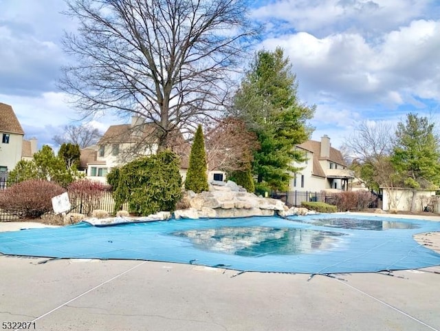 view of pool featuring a fenced in pool, a patio area, and fence