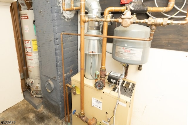 utility room with water heater