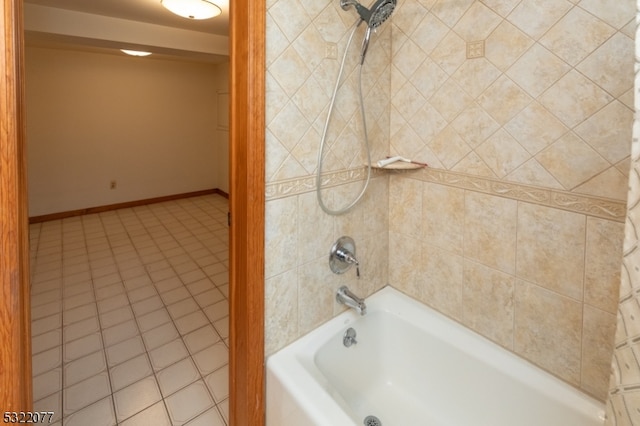 bathroom featuring shower / bath combo and tile patterned flooring