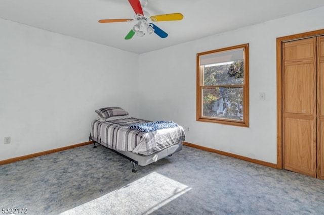 bedroom featuring ceiling fan and carpet flooring