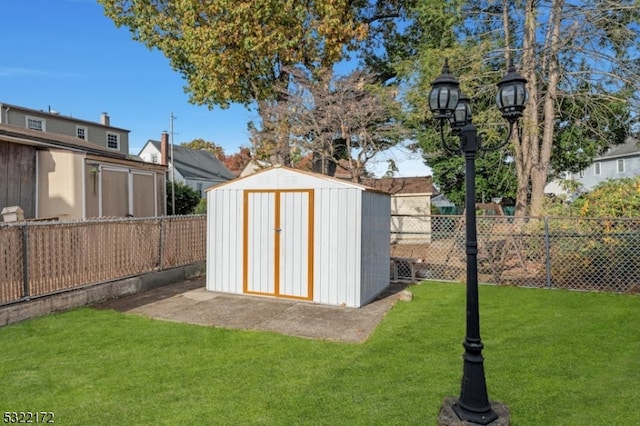 view of outdoor structure featuring a yard