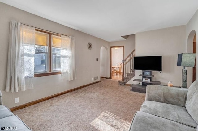 110 Central, Rochelle Park Twp, NJ 07662 - living area with arched walkways, stairs, carpet floors, and baseboards