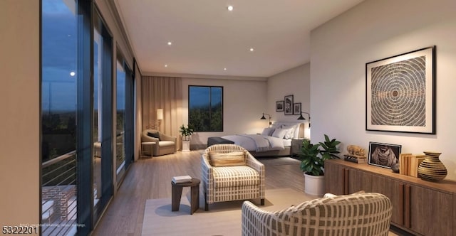 bedroom featuring recessed lighting and wood finished floors