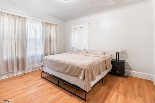 bedroom featuring hardwood / wood-style floors