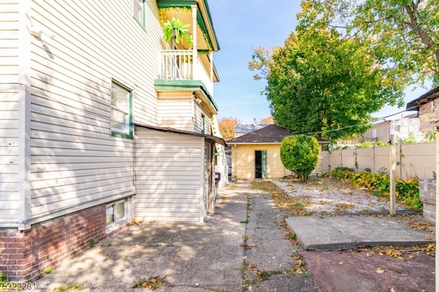 exterior space featuring a patio and a balcony