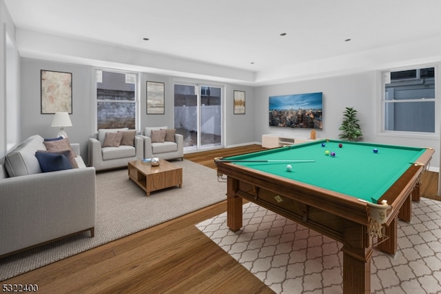 rec room with pool table and light hardwood / wood-style flooring