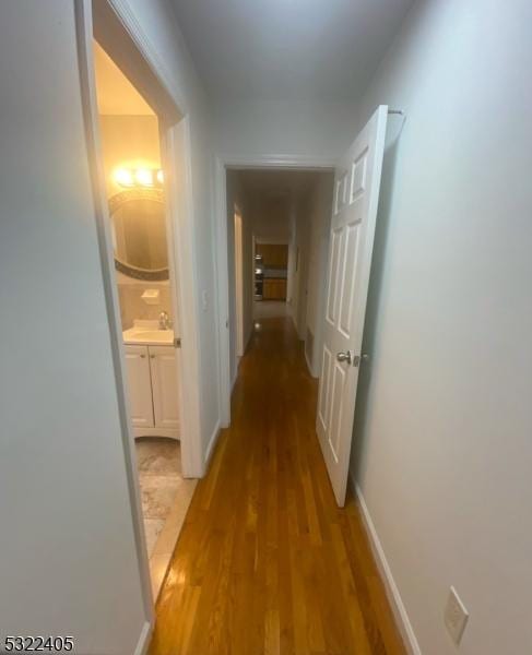 corridor featuring light wood-type flooring