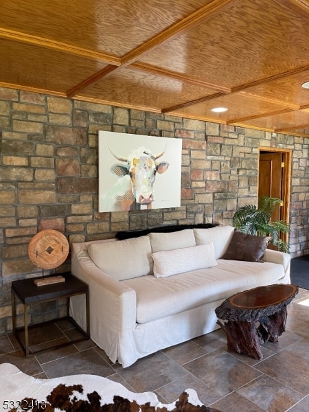 living room featuring wood ceiling and coffered ceiling